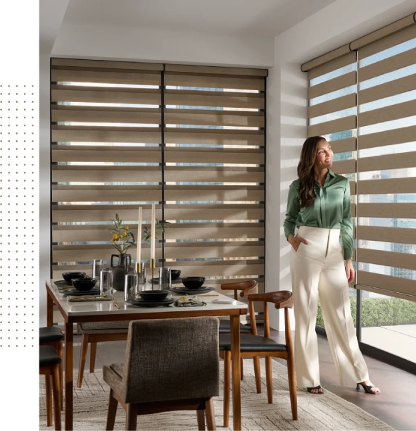 A woman standing in front of a sliding glass door